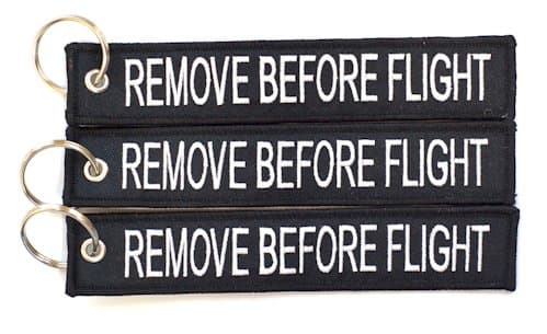 3x EAST WEST TRADE Black/White Remove Before Flight Keychain