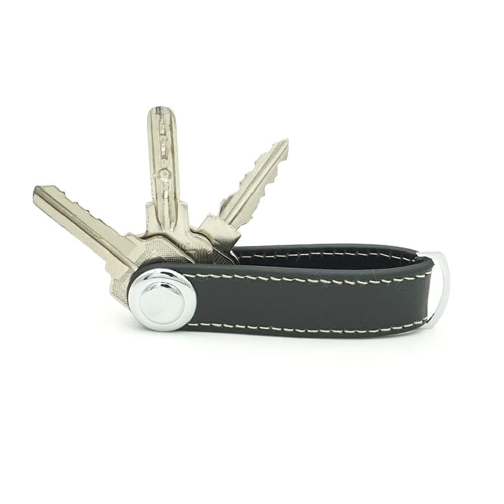 Compact Key Holder - Stylish & Practical Pocket Key Organizer With Secure Locking Mechanism.