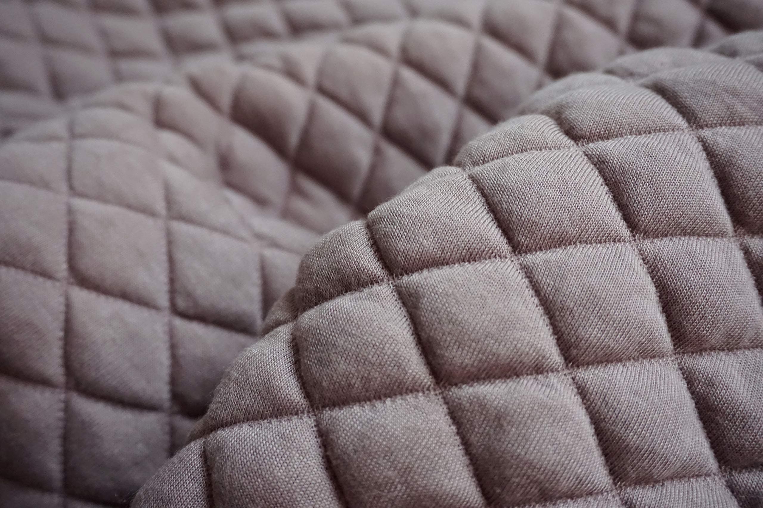 Breakfast in bed tray with structured quilted pattern pillow in pastel taupe shade